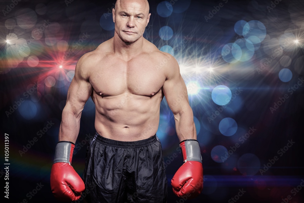Composite image of portrait of bald man with boxing gloves