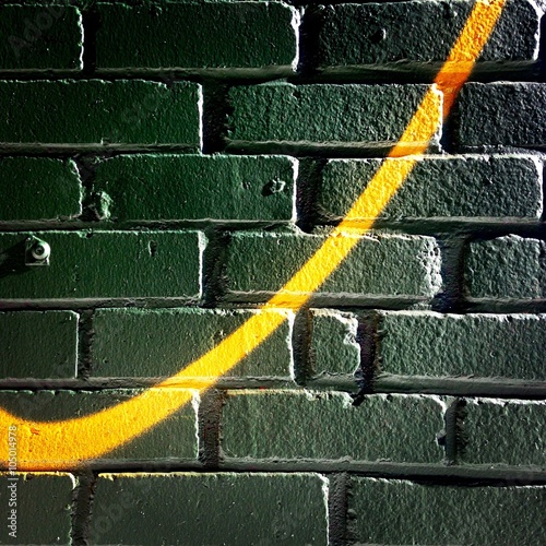 Swoosh on a brick wall