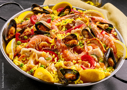 Gourmet seafood paella with prawns and mussels photo