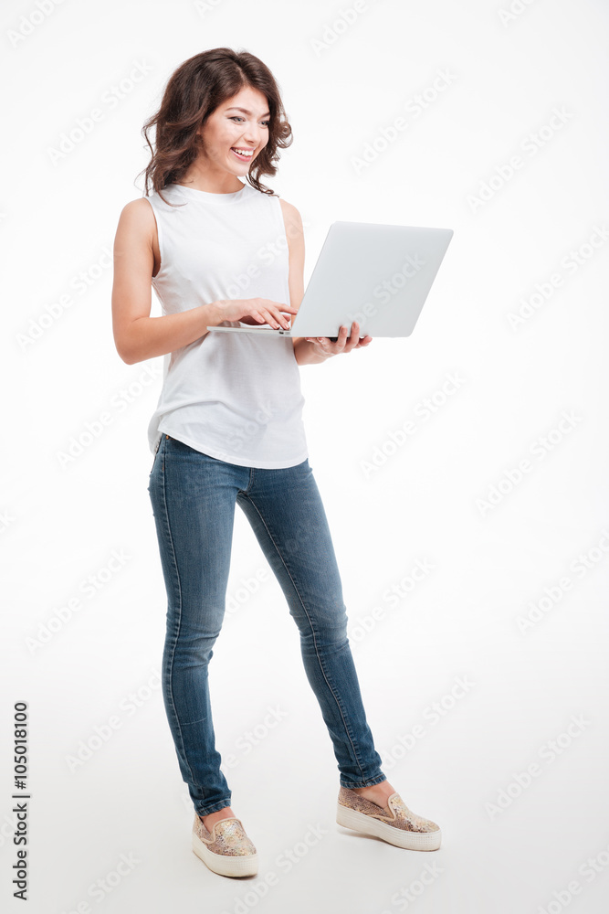 Happy woman using laptop computer Happy woman using laptop computer