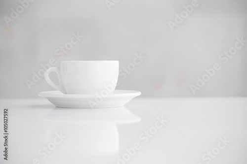 cup on white table