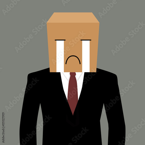 Cardboad businessman with a crying face