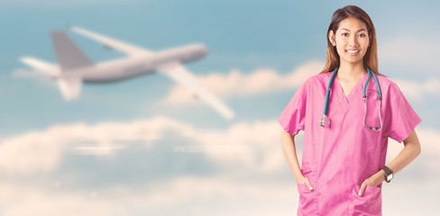 Composite image of asian nurse with stethoscope 