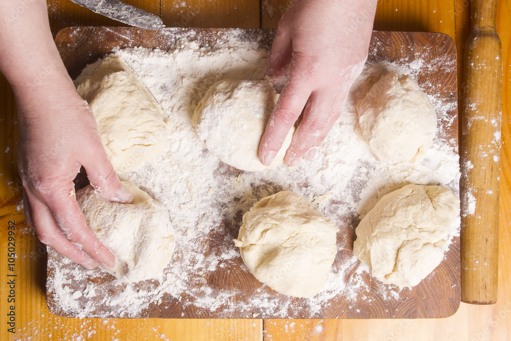 Making dough by female hands Making dough by female hands