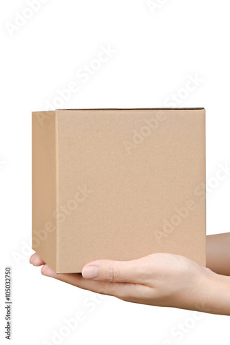 Close-up of female hands holding cardboard box  isolated on whit © bert_13