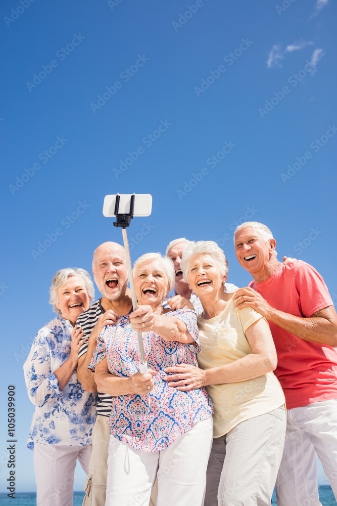 Senior friends taking selfie