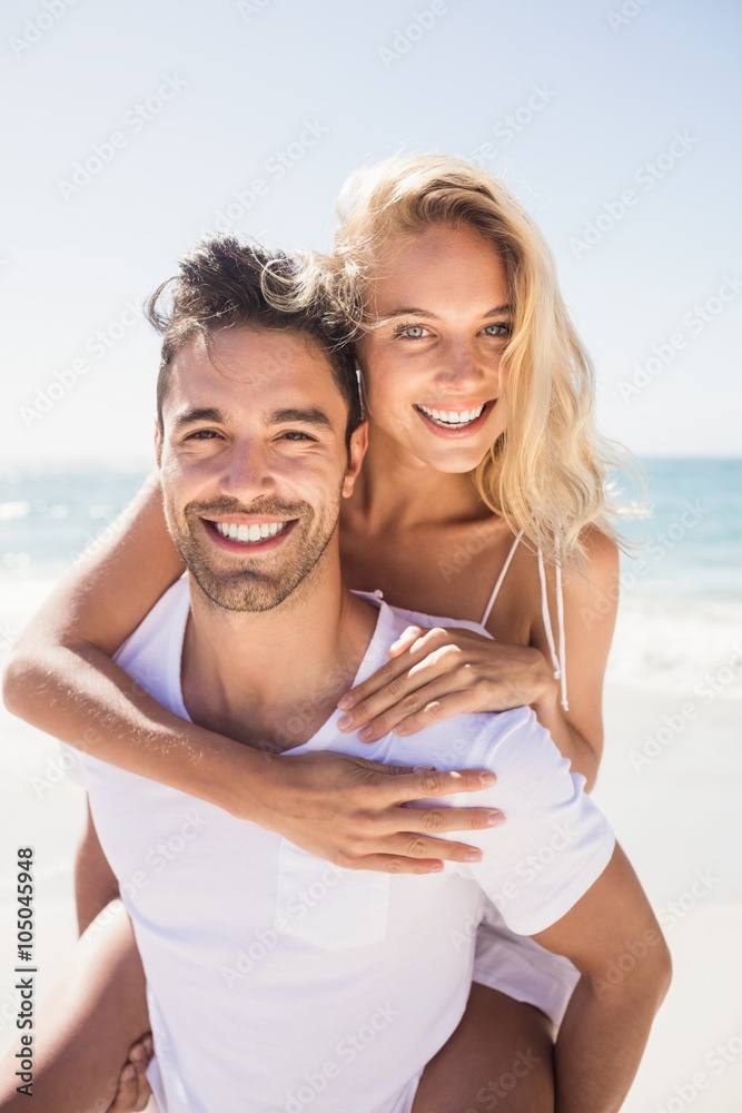 Boyfriend giving piggy back to girlfriend Boyfriend giving piggy back to girlfriend