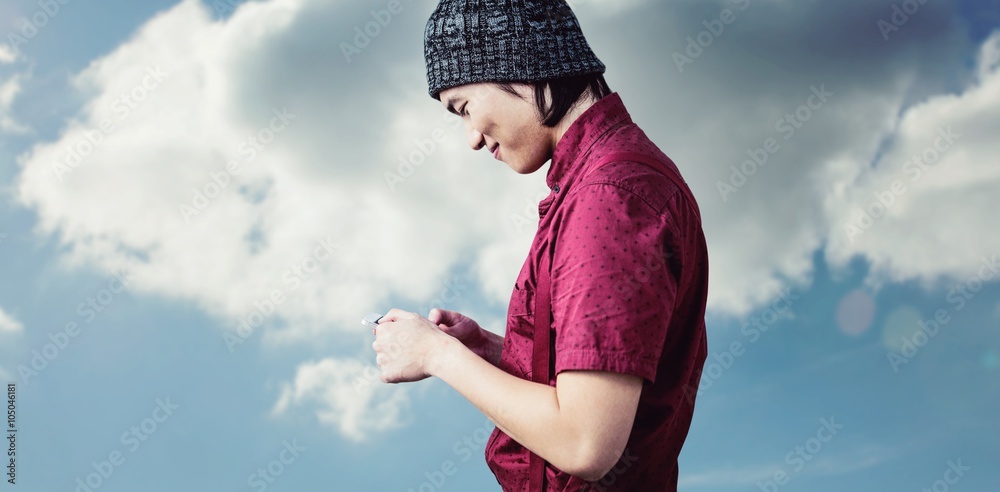 Composite image of smiling hipster businessman using phone Composite image of smiling hipster businessman using phone
