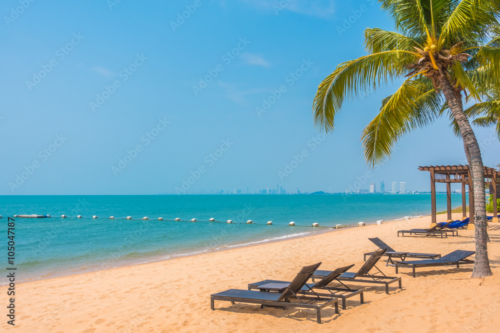 Beautiful beach and sea with palm tree