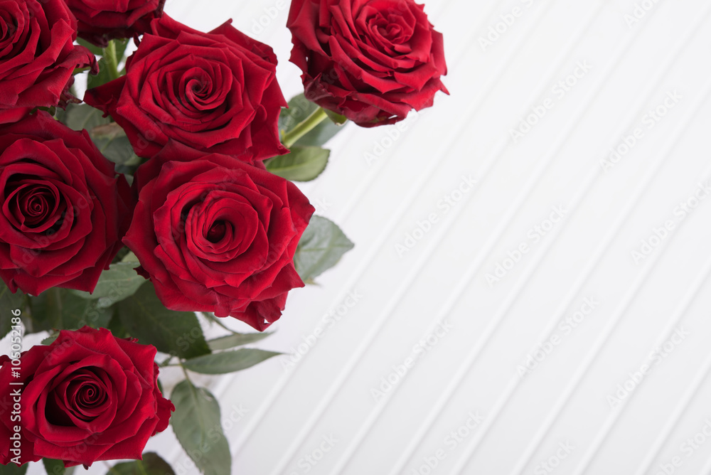 Fototapeta premium Red roses on table