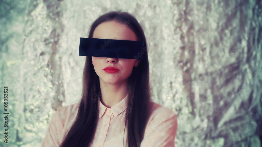 Girl looking mad and wearing glasses covering her eyes
Girl looking mad and wearing glasses covering her eyes