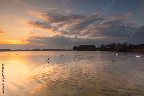 Lake landscape at colorful sunset © milosz_g