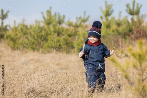 Happy caucasian child playing outdoor © milosz_g