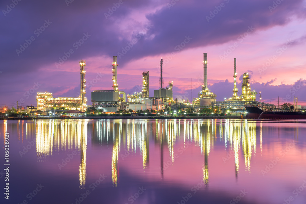 Oil refinery at dramatic twilight