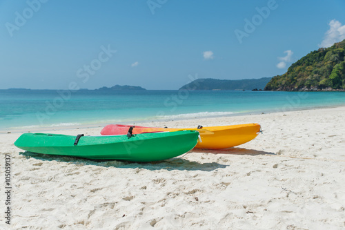 Summer, Travel, Vacation and Holiday concept - Colorful kayaks o