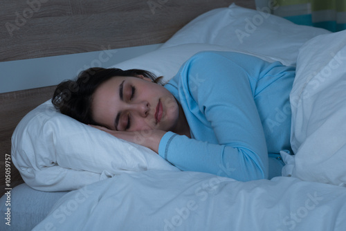Woman Sleeping On Bed