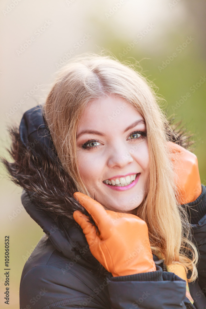 Naklejka premium Portrait of pretty smiling woman in jacket.