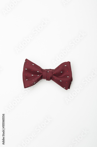 handmade red bow-tie with colorful patterns