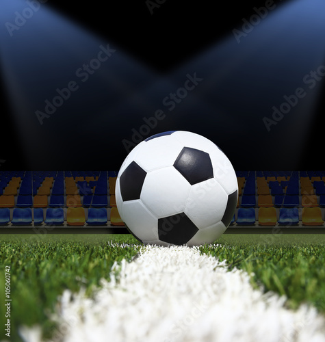 Fototapeta Naklejka Na Ścianę i Meble -  Soccer ball on the green field