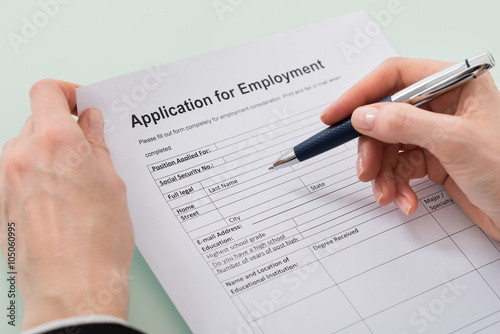 Woman Hand Filling Employment Form