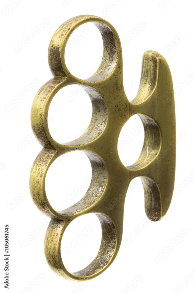 Brass knuckle-duster, weapon for hand, isolated on white backgro Stock  Photo
