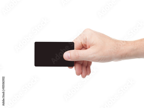 black card in a human hand isolated on white background