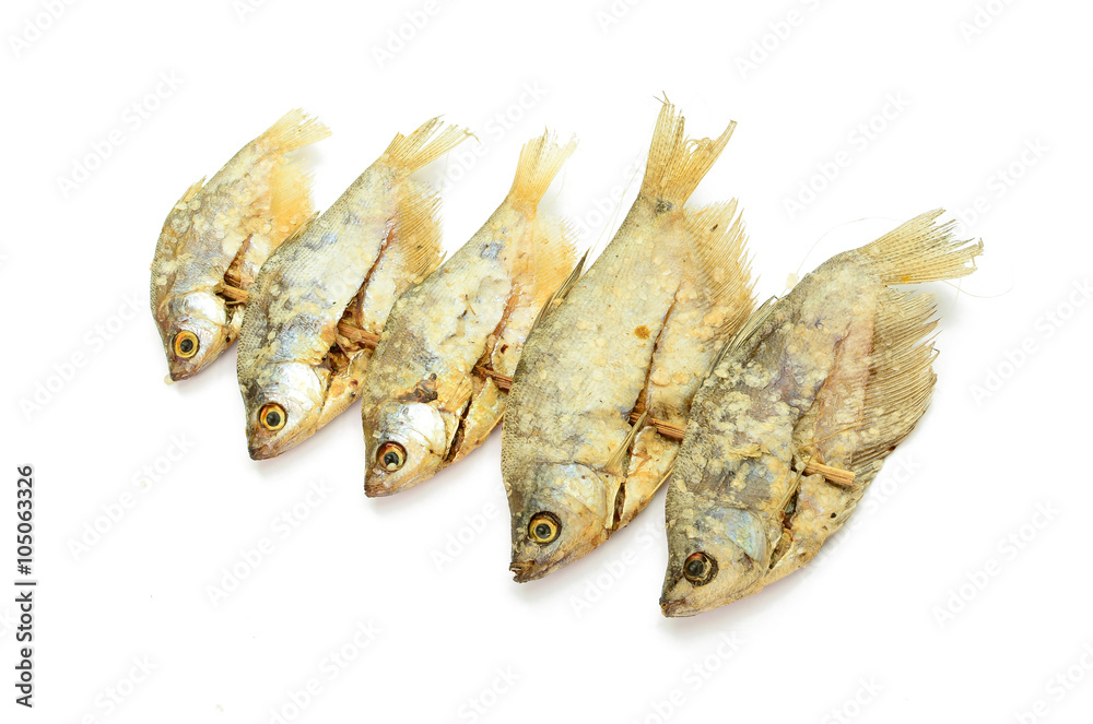 dried fish fillets skewers on a white background dried fish fillets skewers on a white background