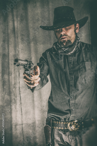 Tableau sur toile Cowboy Gunslinger Pointing Gun