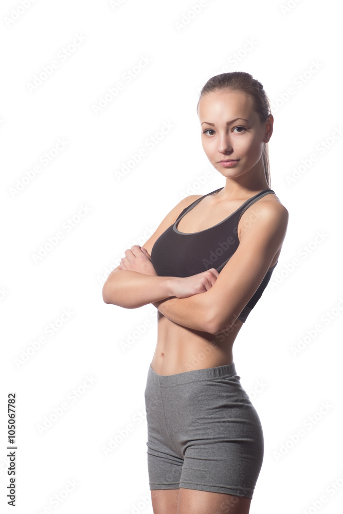 fitness woman in sport style standing against white background fitness woman in sport style standing against white background