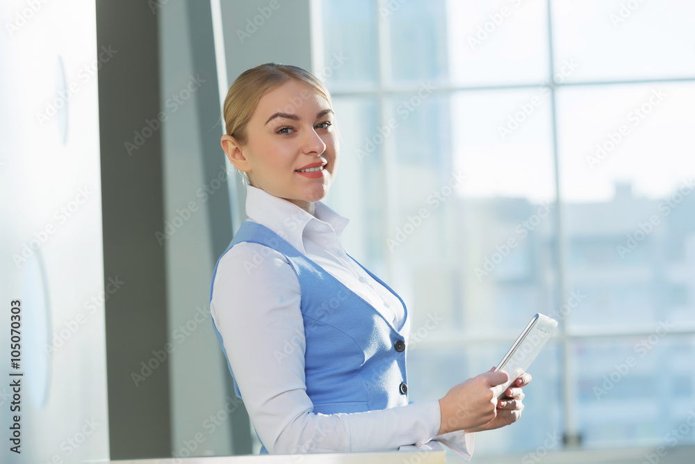 Attractive woman in office building Attractive woman in office building