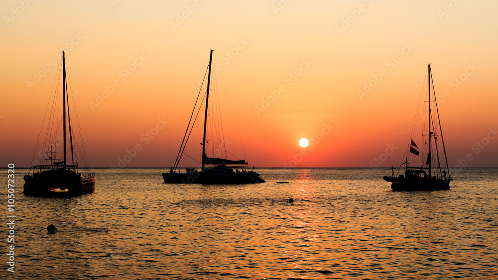 Sunset on the sea with boat