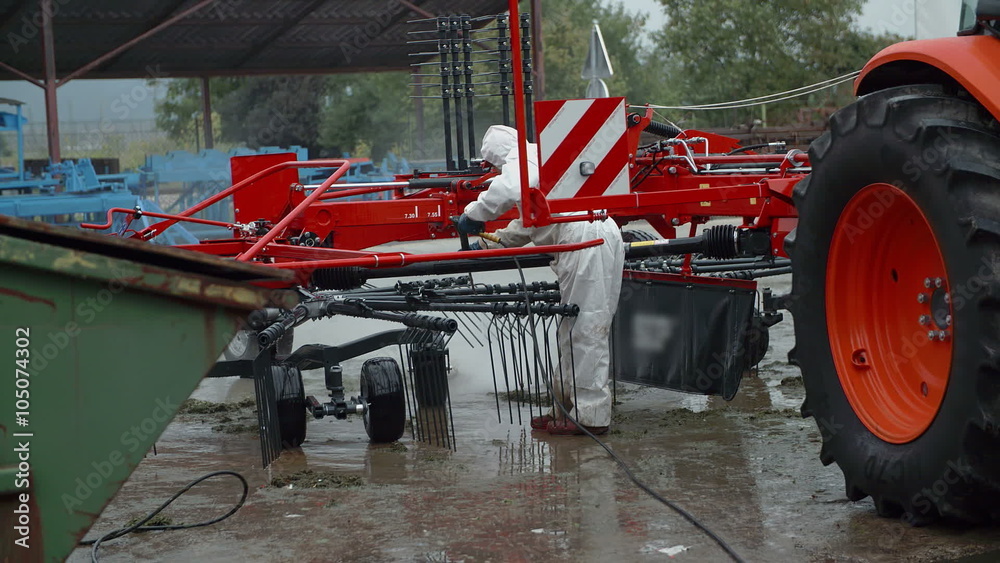 Washing the machinery and the tractor Washing the machinery and the tractor