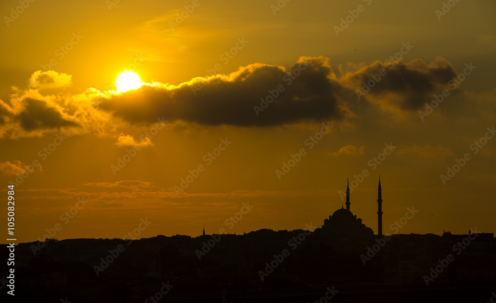 The old mosque and minaret at sunset in Istanbul