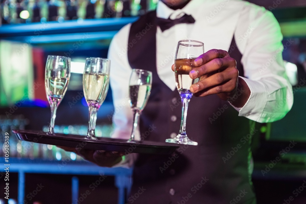 Bartender serving champagne