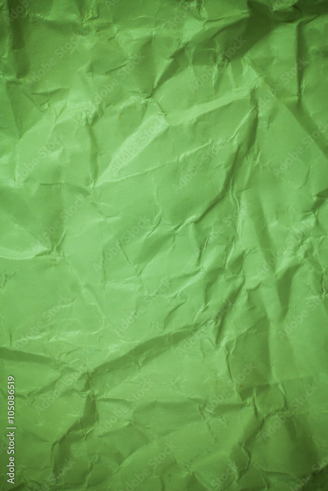 Fototapeta premium Paper background, Crumpled green paper texture.
