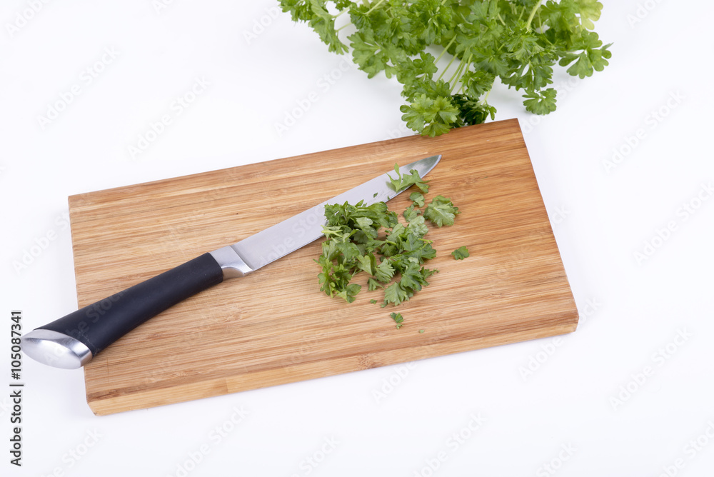 parsley on a chopping board cookery parsley on a chopping board cookery