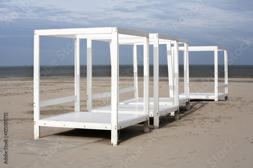 White frames on the beach