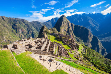 Fototapete Südamerika Inkastadt Machu Picchu im Sonnenlicht  © saiko3p