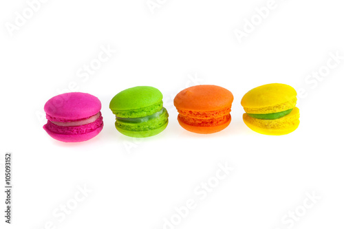 Colorful french macaroons on a white background.