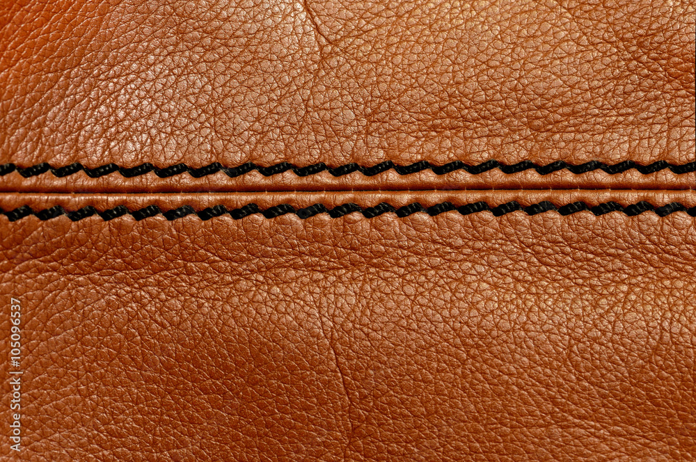 Macro brown leather with black stitching Macro brown leather with black stitching