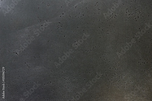 Macro texture of dark brushed scratched metal