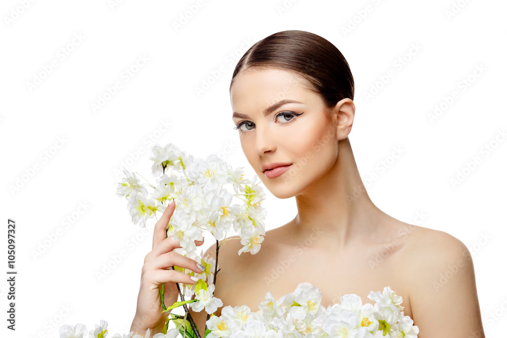 Beautiful Woman with Clean Fresh Skin holding flowering branches Beautiful Woman with Clean Fresh Skin holding flowering branches