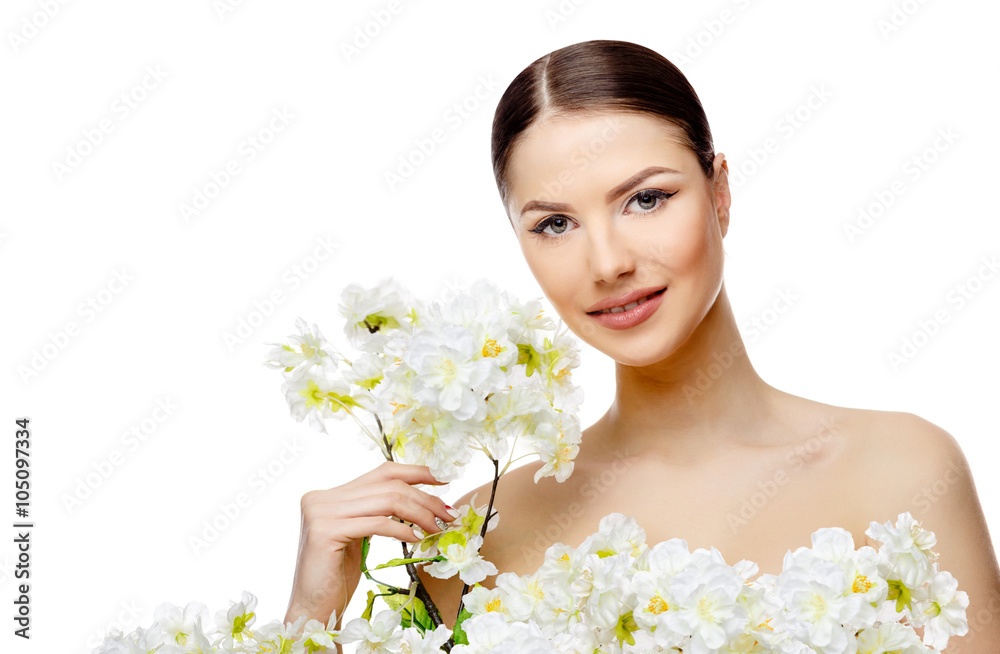 Beautiful Woman with Clean Fresh Skin holding flowering branches Beautiful Woman with Clean Fresh Skin holding flowering branches