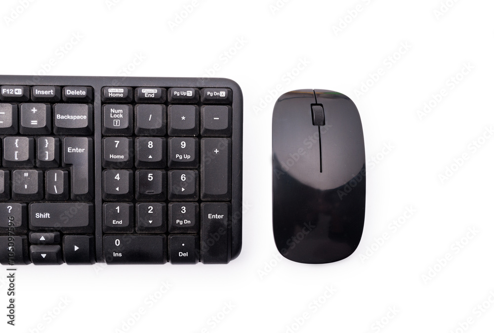 Close-up of workplace with black keyboard and mouse Close-up of workplace with black keyboard and mouse
