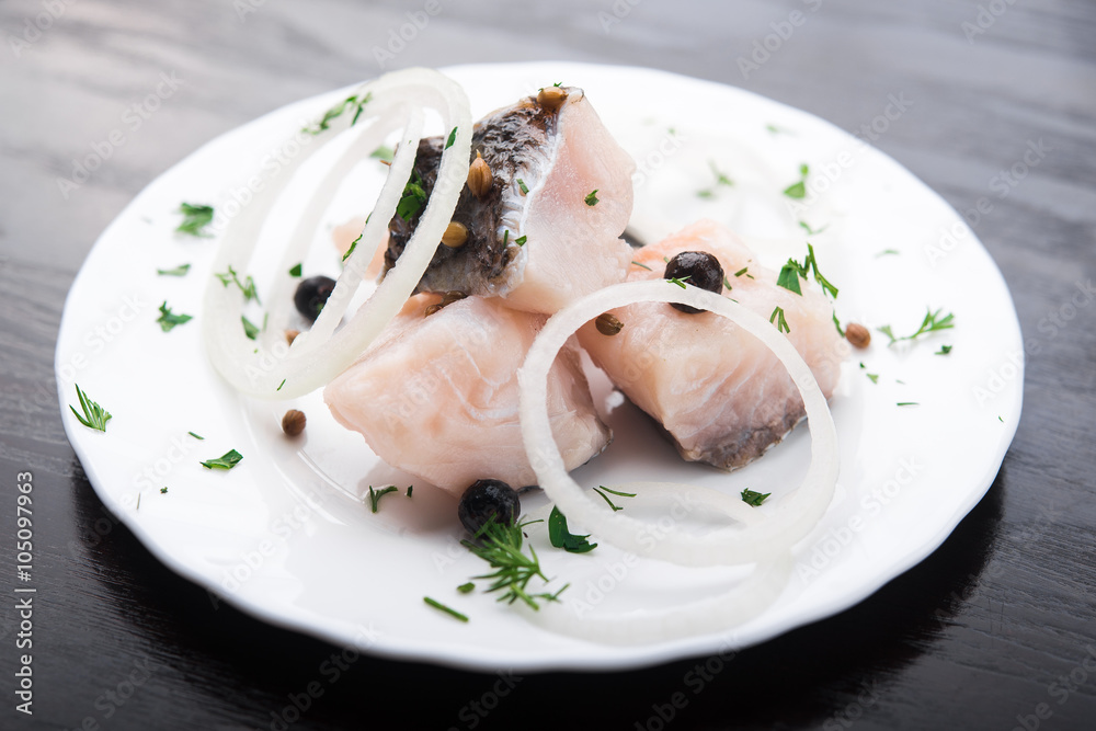 fresh herring fish with spices