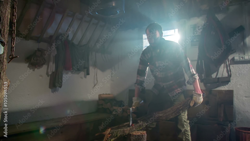 With an axe chopping the wood With an axe chopping the wood