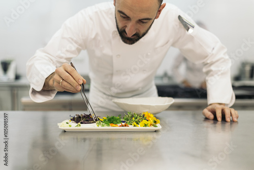 Male professional chef cooking.