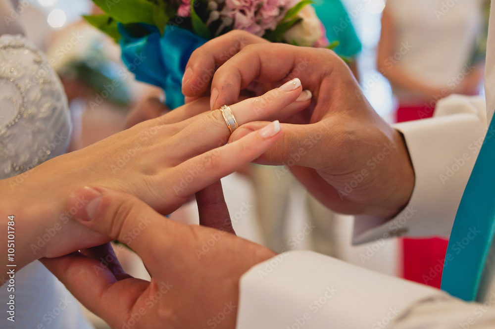Fototapeta premium Wedding couple hands with rings
