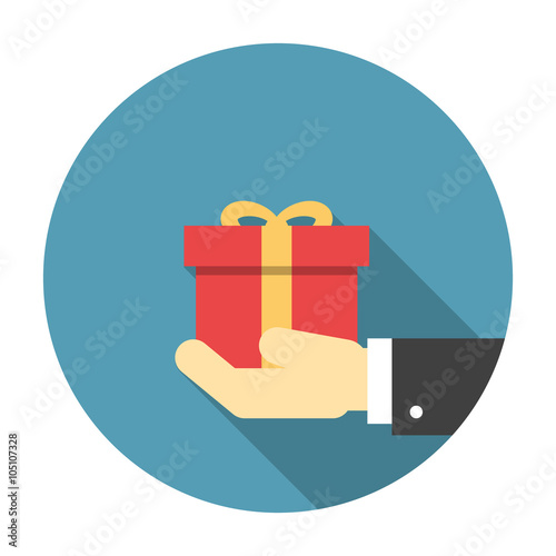 Gift box in hand flat icon