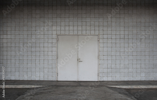 steel door and concrete surrounding.